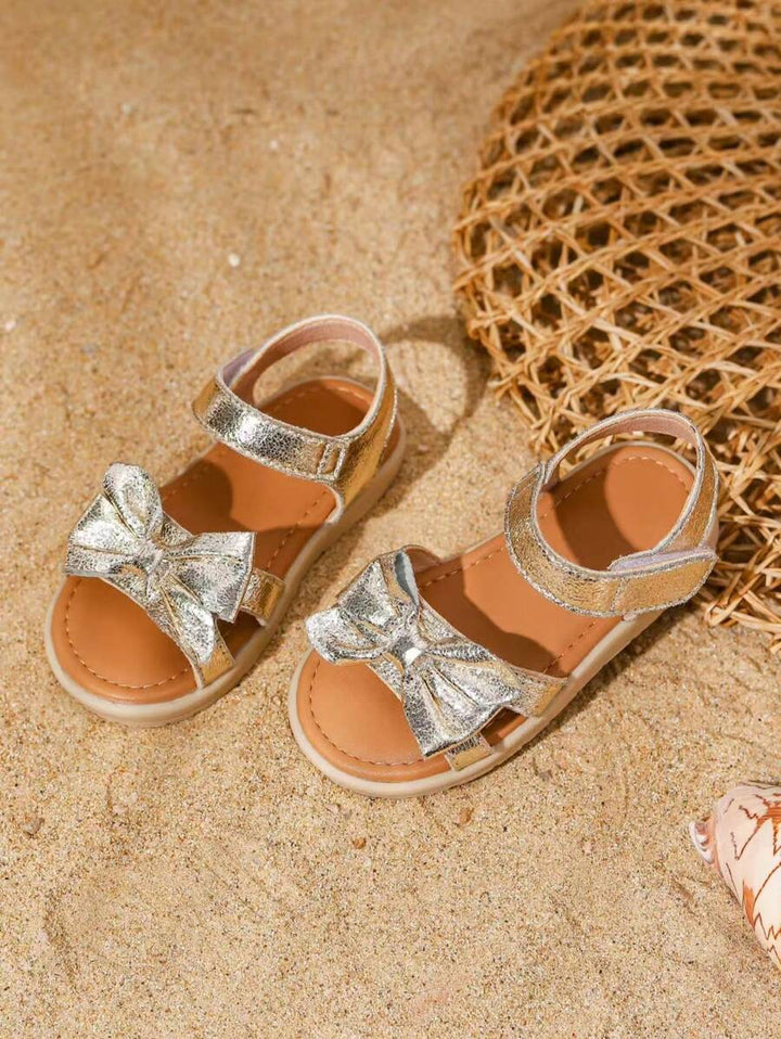 Gele zomerschoenen: meisjes prinsessensandalen met elegante strik, comfortabel en speels.