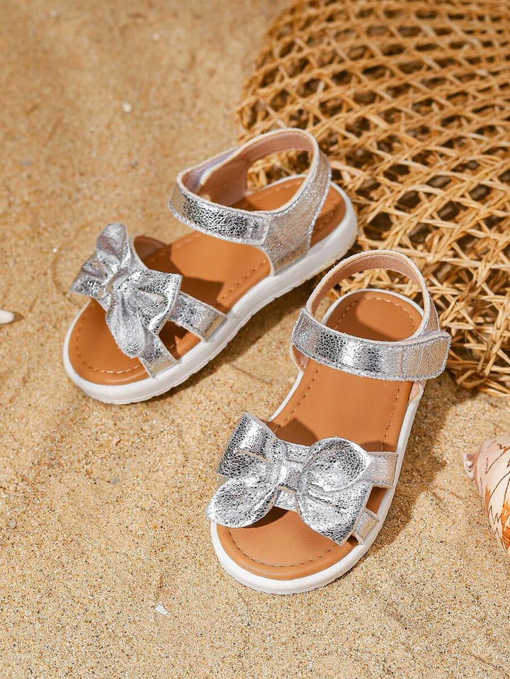 Groene prinsessensandalen voor meisjes, met speelse strik en comfortabel klittenband, perfect voor peuters.