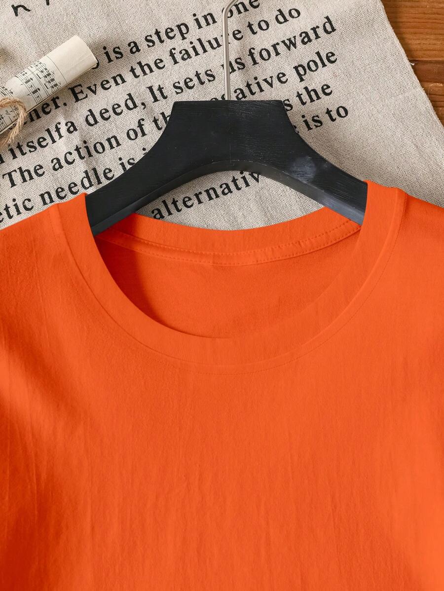 Dames T-shirt, oranje, met levendige fruitprint en speelse tekst. Must-have voor casual zomerlooks en Koningsdag.