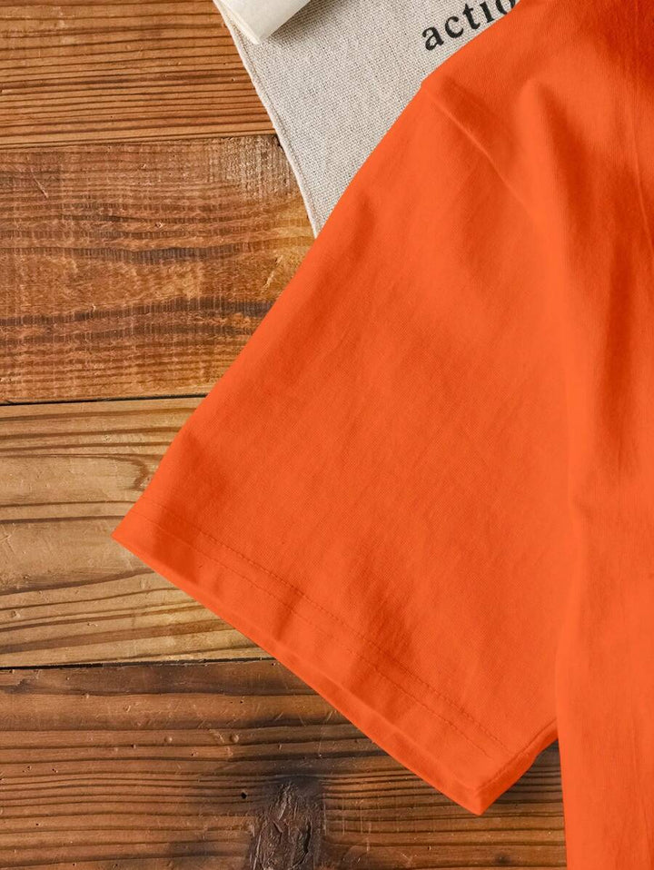 Vrolijk oranje dames T-shirt met fruitprint en tekst. Deze korte mouwen top is perfect voor een casual lente/zomer look.