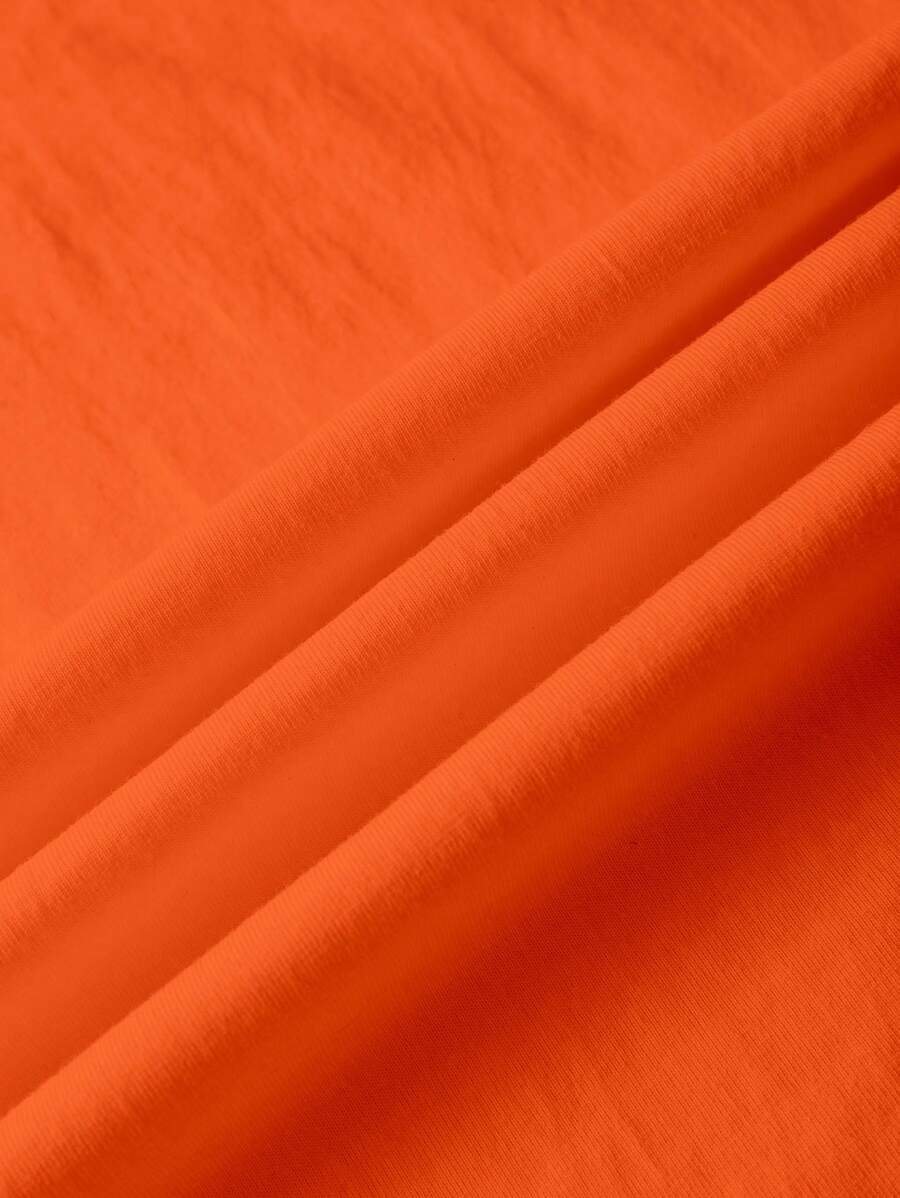 Oranje dames T-shirt met unieke fruitprint en opvallende tekst. Trendy casual dameskleding voor Koningsdag en de zomer.