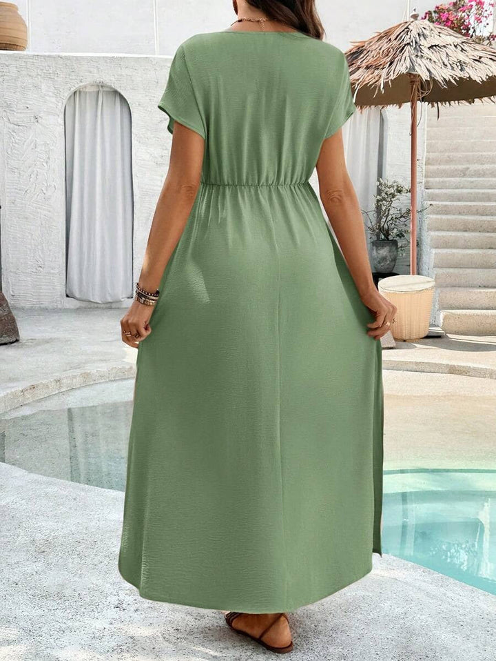 Zwangerschapsjurk, V-hals en split, zachte polyester-katoen blend, perfect voor de zomer.