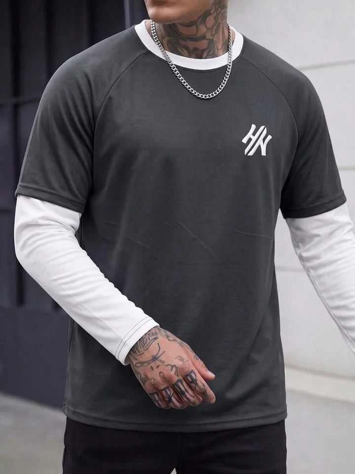 Streetwear heren longsleeve met handgeschreven print. Ronde hals en comfortabele pasvorm voor lente.