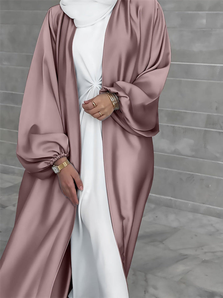 Islamitische kleding: elegante abaya damesjurk met riem. Modest fashion maxi-jurk voor verfijnde stijl.