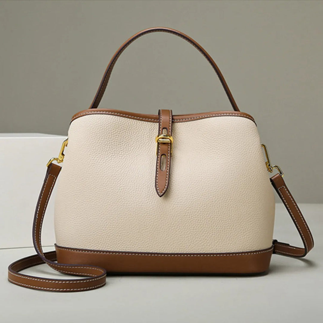 Modieuze beige dames schoudertas, tweekleurig en stijlvol, ideaal voor zowel zakelijke als dagelijkse outfits.