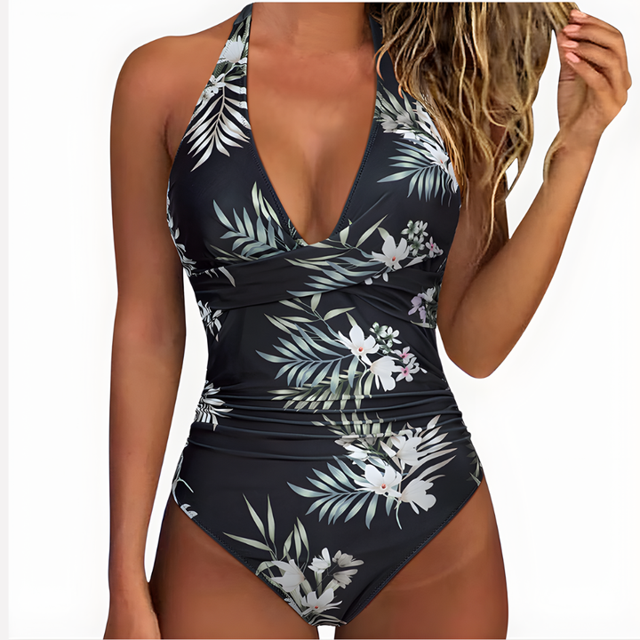 Geplooid damesbadpak, vormgevend en comfortabel, een must-have voor de zomer.
