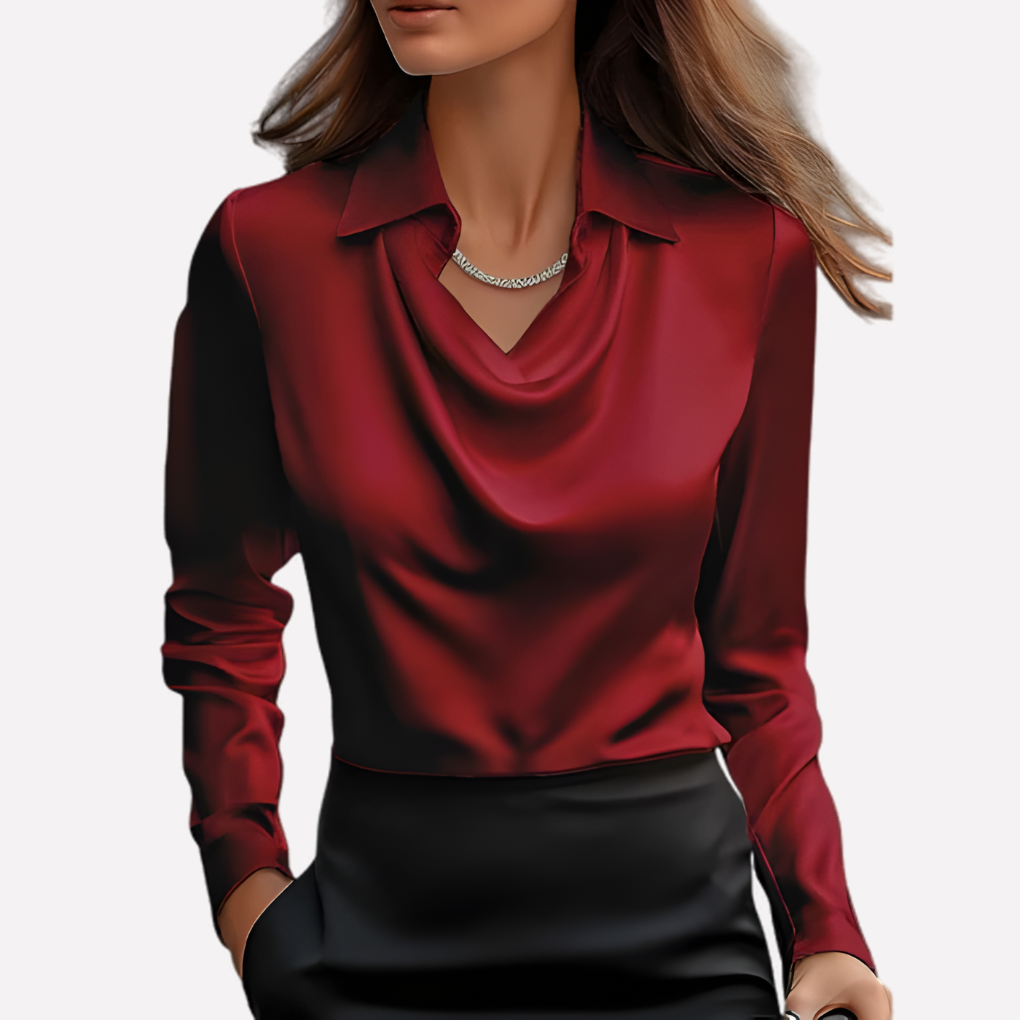 Comfortabele dames blouse met gedrapeerde kraag en lange mouwen. Ontspannen pasvorm voor dagelijks gebruik.