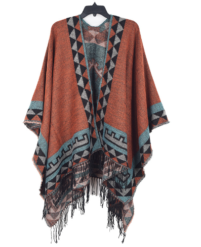 Comfortabele en modieuze dames poncho Kiki, perfect voor een warme, stijlvolle look in de winter.