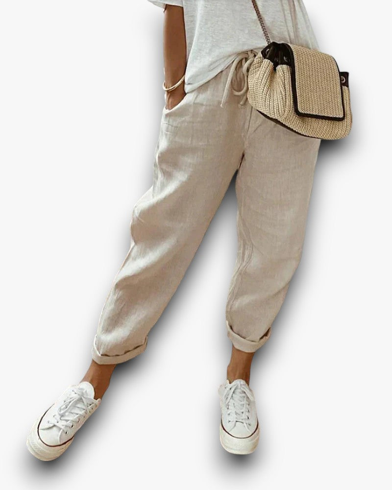 Veelzijdige dames linnen broek, stijlvol en comfortabel, ideaal voor een casual zomerdag.