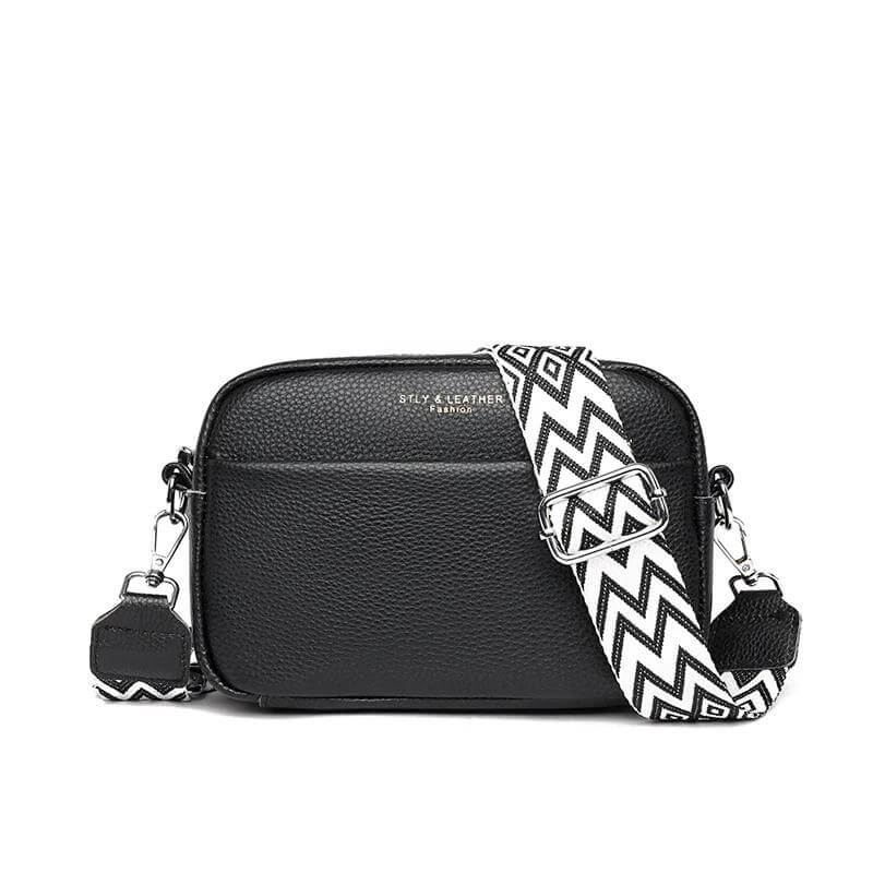 Stijlvolle leren dames schoudertas, compact en elegant, perfect accessoire voor elke outfit.