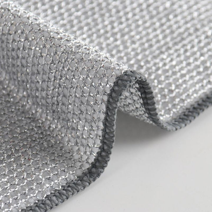 Multifunctioneel schoonmaakdoekje absorbeert water, perfect voor snelle en efficiënte reiniging.