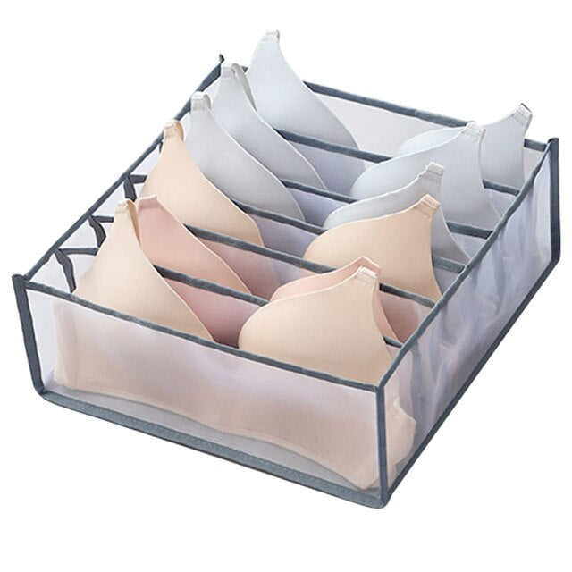 Universele nylon kast organizer voor efficiënte kledingopslag; creëert orde in elke garderobe.