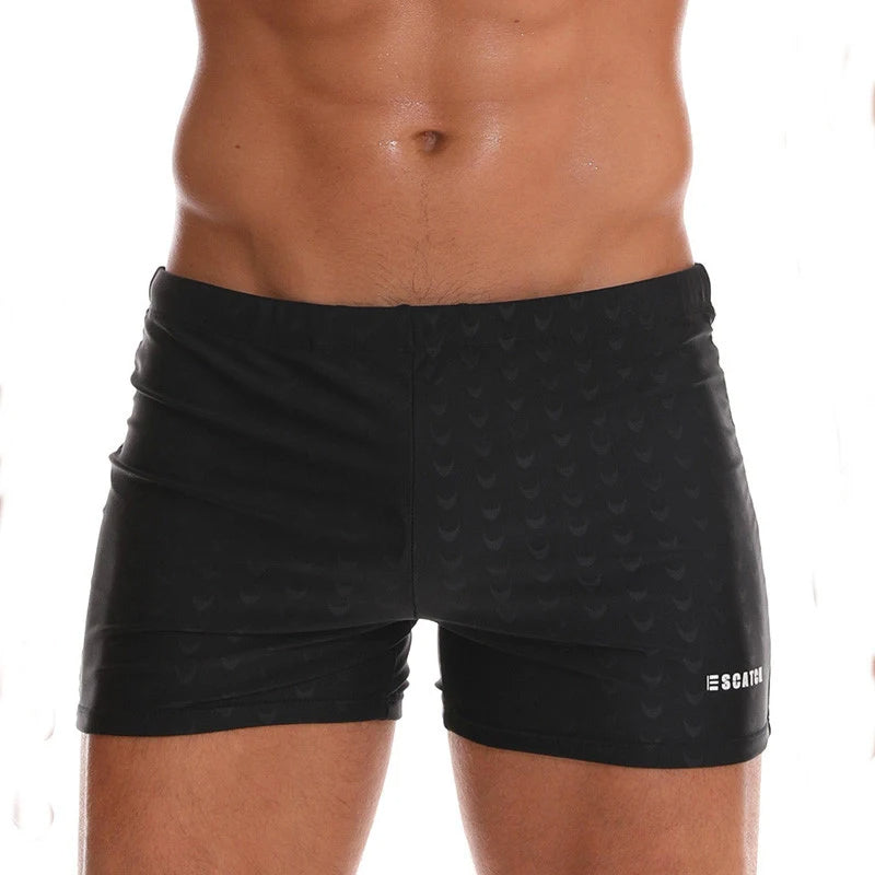 Trendy heren zwemshort met levendige bloemenprint, perfecte strandkleding voor zomer en vakantie.