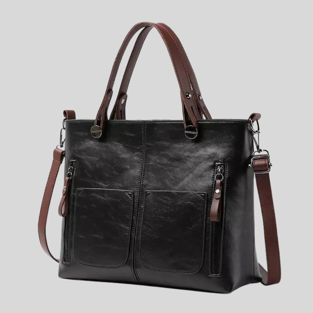 Elegante zwarte leren schoudertas voor dames, gemaakt van echt leer. Verfijnd design, ideaal voor elke outfit.