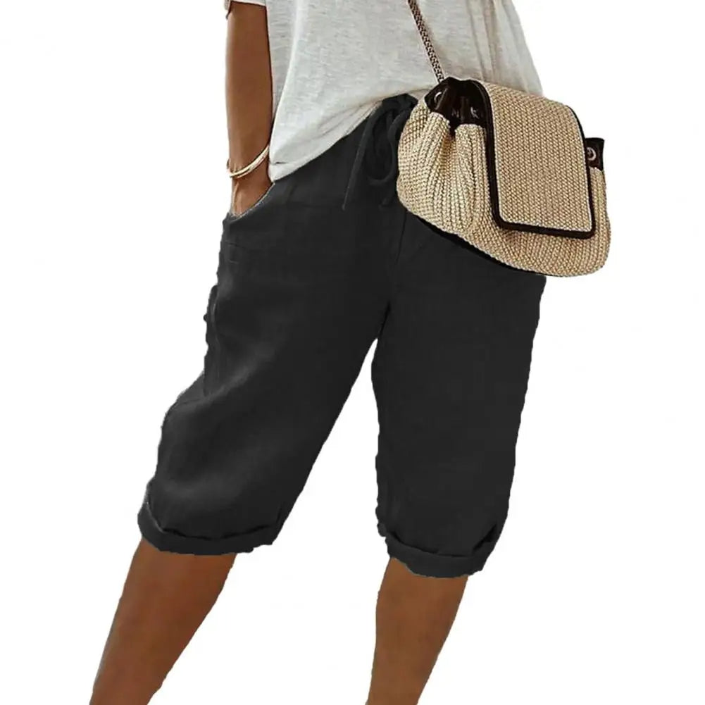 Dames vintage kniebroek met comfortabele elastische taille en losse pasvorm, ideaal voor zomerse casual kleding.