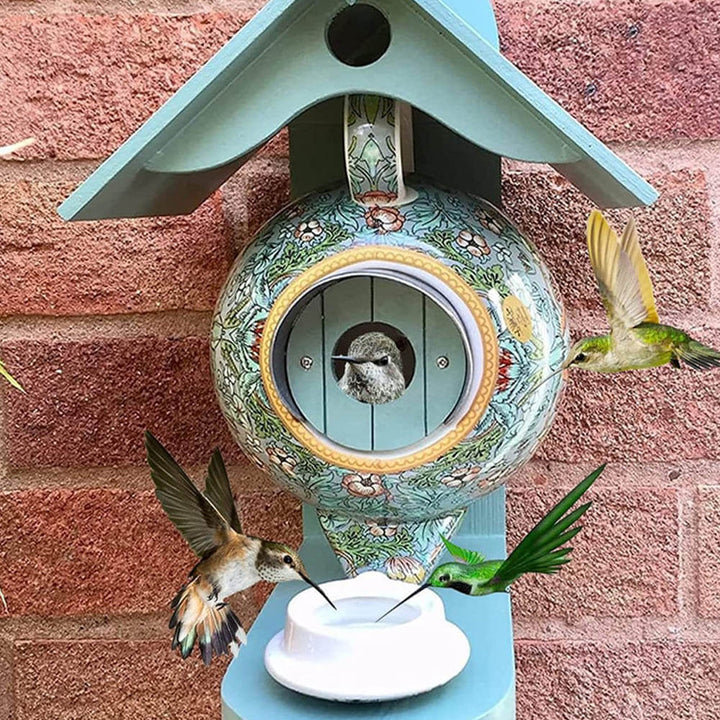 Vogelvoederhuis theepot van keramiek en hars voor tuindecoratie; trekt vogels aan. Perfect cadeau.