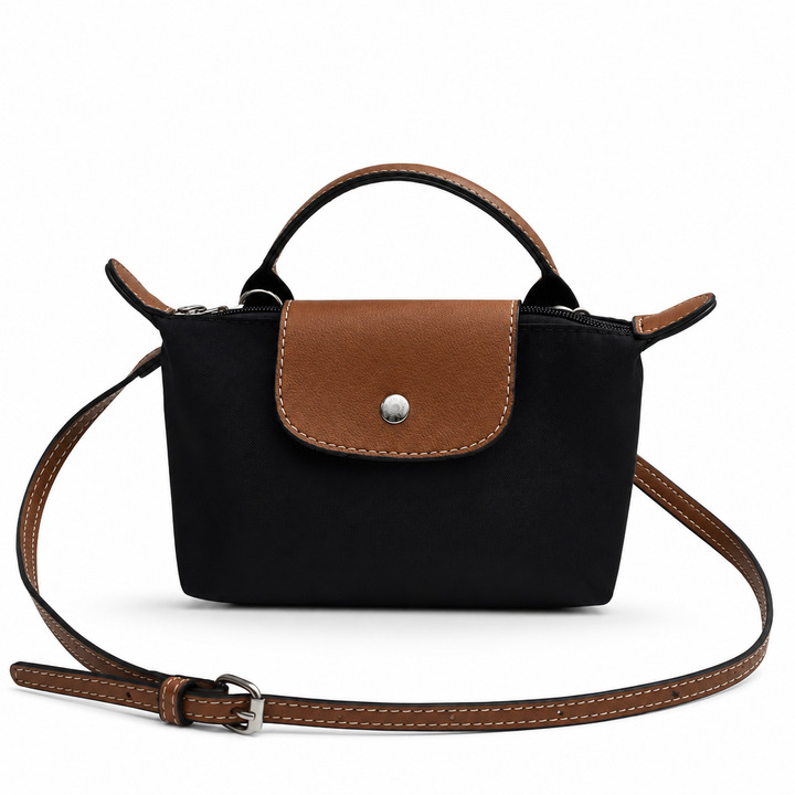 Elegante mini kruistas voor dames, gemaakt van kunstleer. Perfecte mode accessoire voor dagelijks gebruik.