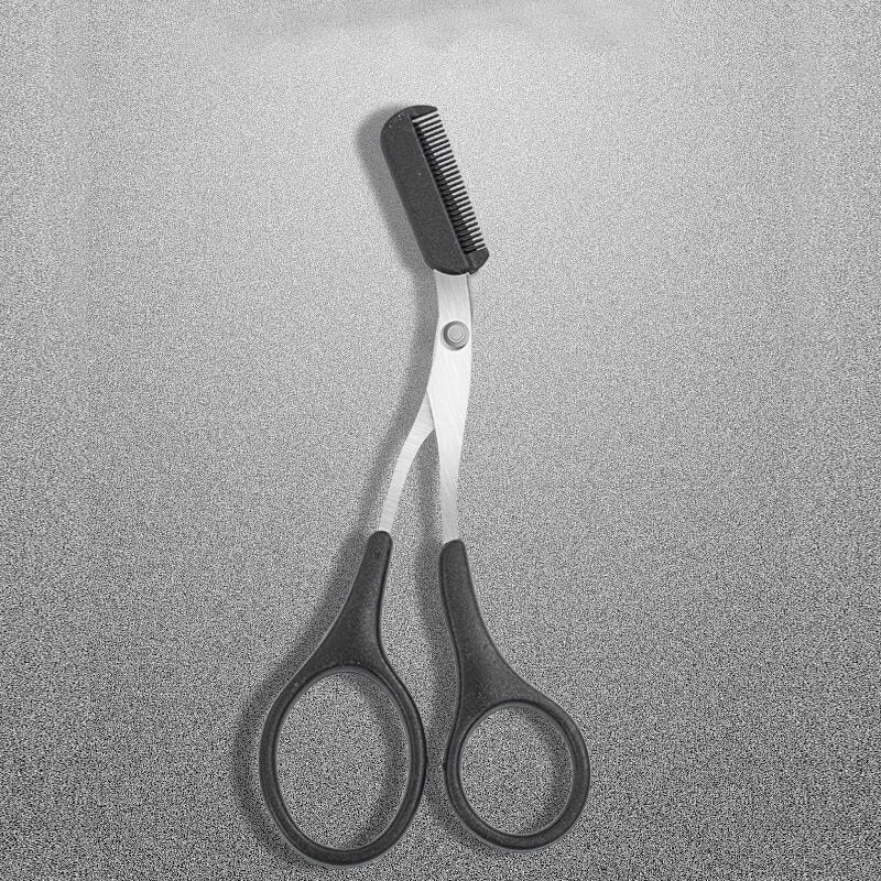 Dames wenkbrauwenschaar met precisiekam voor perfect getrimde wenkbrauwen. Beautytool voor nauwkeurige verzorging.