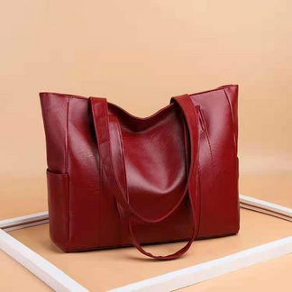 Stijlvolle vintage leren schoudertas voor dames, verkrijgbaar in klassiek bruin en elegant zwart.