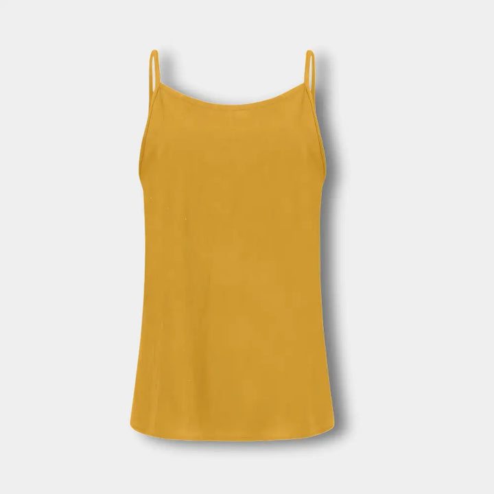 Elegante dames spaghettibandjes top, perfect voor vakantie en een luchtige zomer outfit.