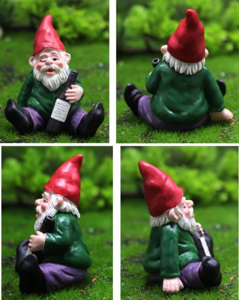 Grappige dronken kabouter tuinbeeld van hars, perfect voor humoristische tuindecoratie.