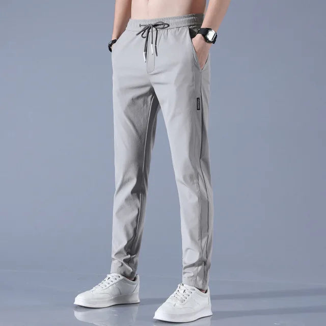 Sneldrogende heren sportbroek, ideaal voor workouts of casual gebruik. Ademend en flexibel.