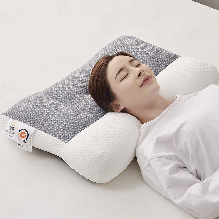 Ergonomisch neksteunkussen voor optimale slaaphouding. Wit textiel hoofdkussen tegen nekpijn en rugklachten.