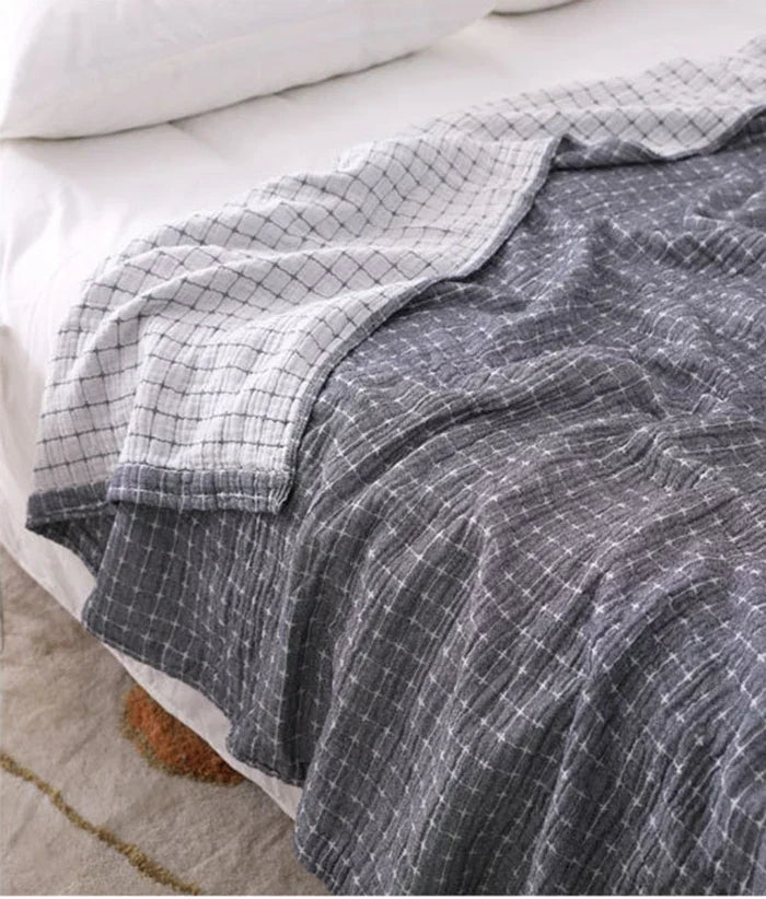 Zachte, ademende katoenen deken voor bank of bed. Lichtgewicht BreezyCotton plaid, perfect voor een casual interieur.