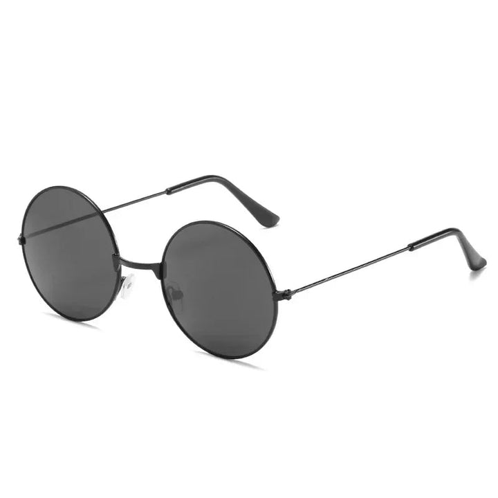 Unisex ronde zonnebril met UV400 bescherming. Stijlvol mode accessoire voor een trendy zomerlook.