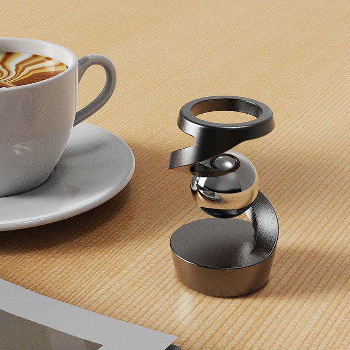 Minimalistische SANDSBERGORIGINALS gyroscoop voor stressvermindering en meditatie.