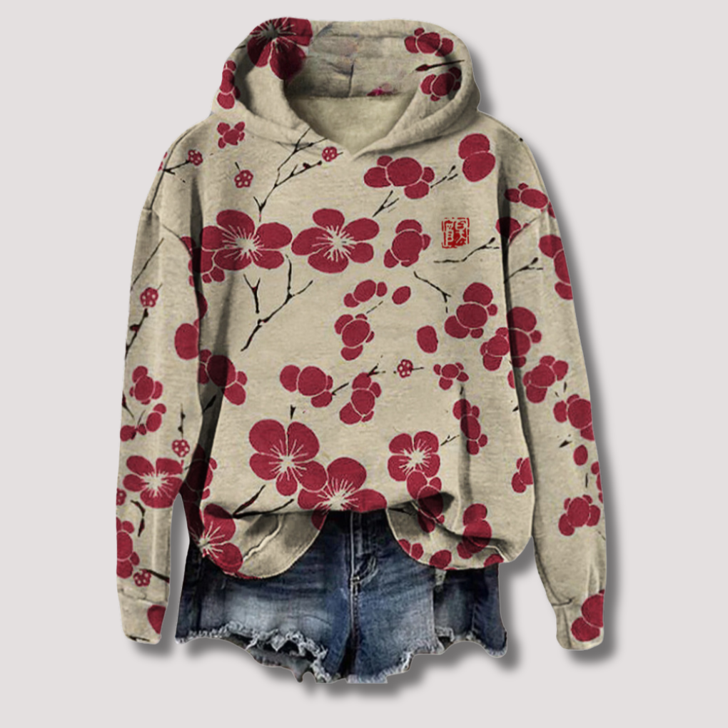 Casual dames lichtgewicht trui met capuchon, voorzien van een elegante bloemenprint. Perfect voor lente en ontspanning.
