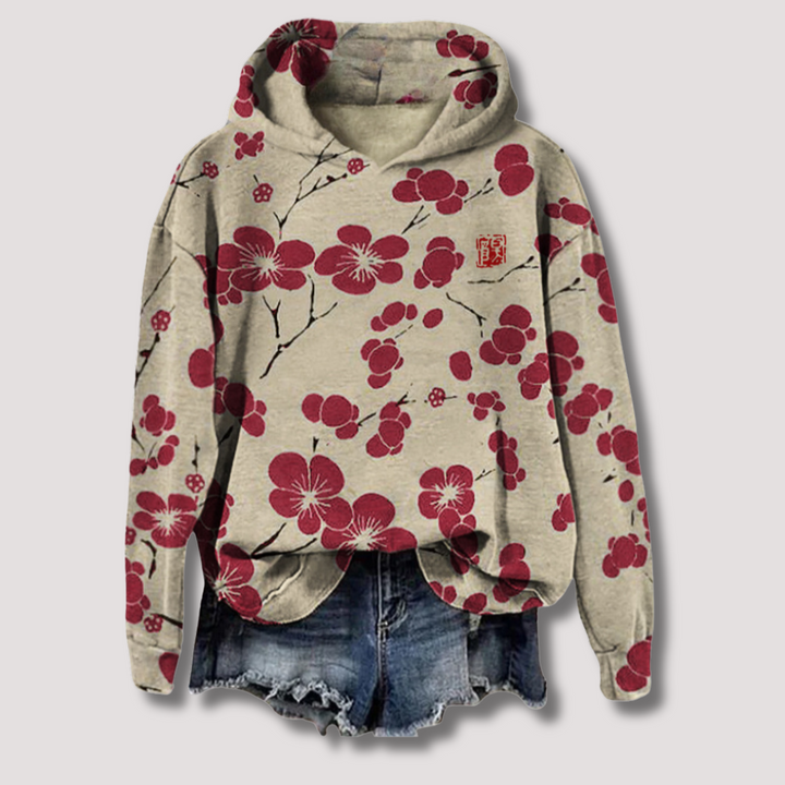 Casual dames lichtgewicht trui met capuchon, voorzien van een elegante bloemenprint. Perfect voor lente en ontspanning.