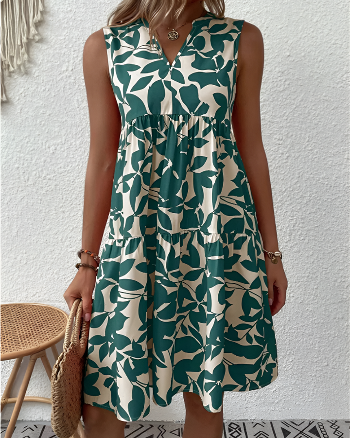 Luchtige dames zomer midijurk met knoopsluiting, perfect voor casual dagen en strand. Comfortabel en stijlvol.
