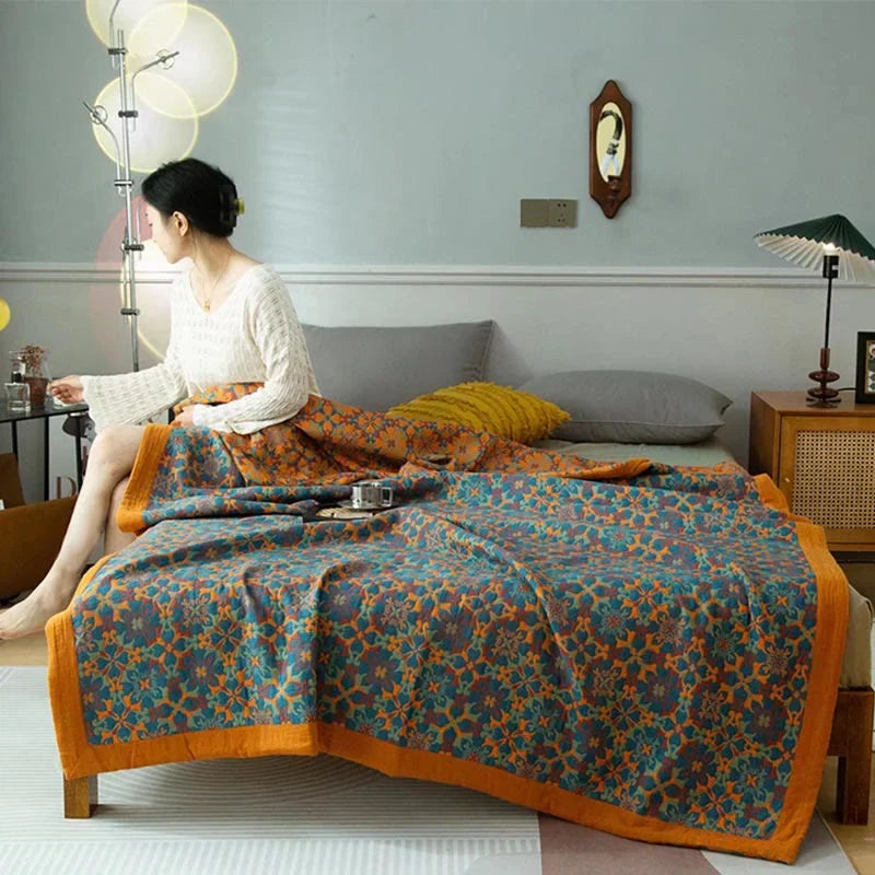 Zeslaags katoenen quilt met levendig oranje & blauw geometrisch patroon. TerraLoom dekbed, comfortabel en decoratief.