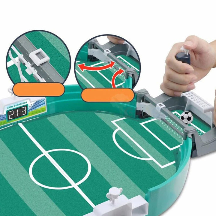 Gezinnen spelen samen met het actievolle interactieve Goalino tafelvoetbalspel indoor.