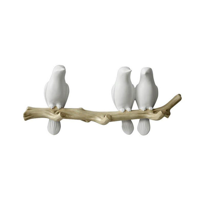 Wandkapstok met vogels. Speels design voor jassen en hoeden. Perfecte wanddecoratie voor thuis.
