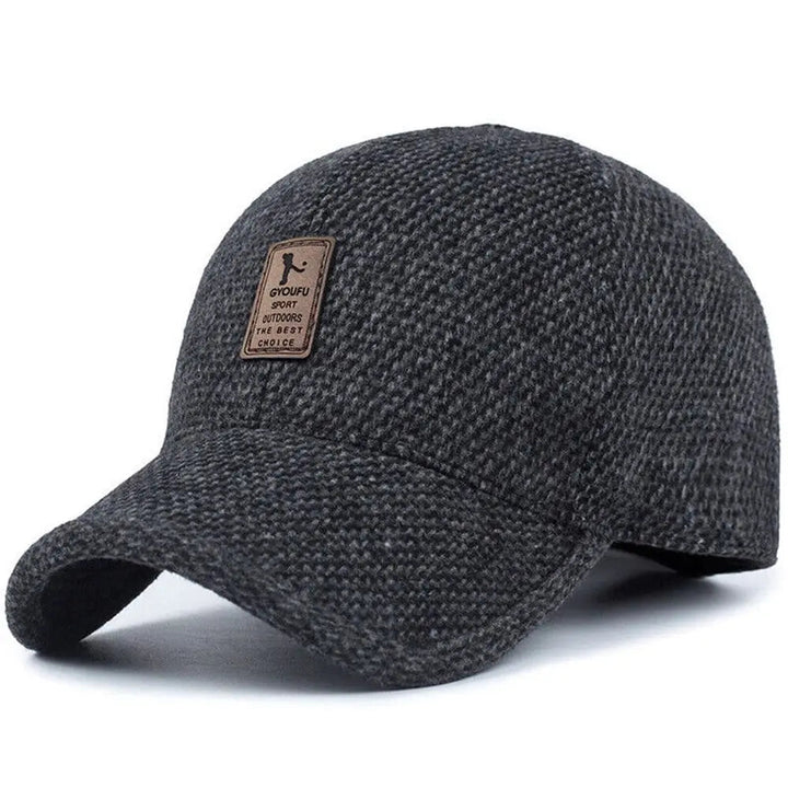 Warme heren wollen wintermuts met oorbescherming, retro stijl. Ideale winterpet voor heren.