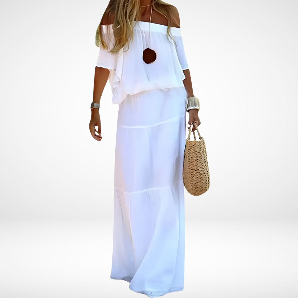 Boho-stijl dames maxi jurk in luchtige chiffon. Off-shoulder elegante zomerjurk, ideaal voor strand en vakantie.