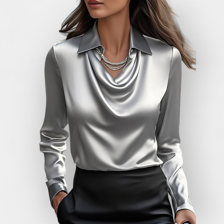 Stijlvolle damesblouse met watervalkraag, ideaal voor een zakelijke look of elegante avondkleding.