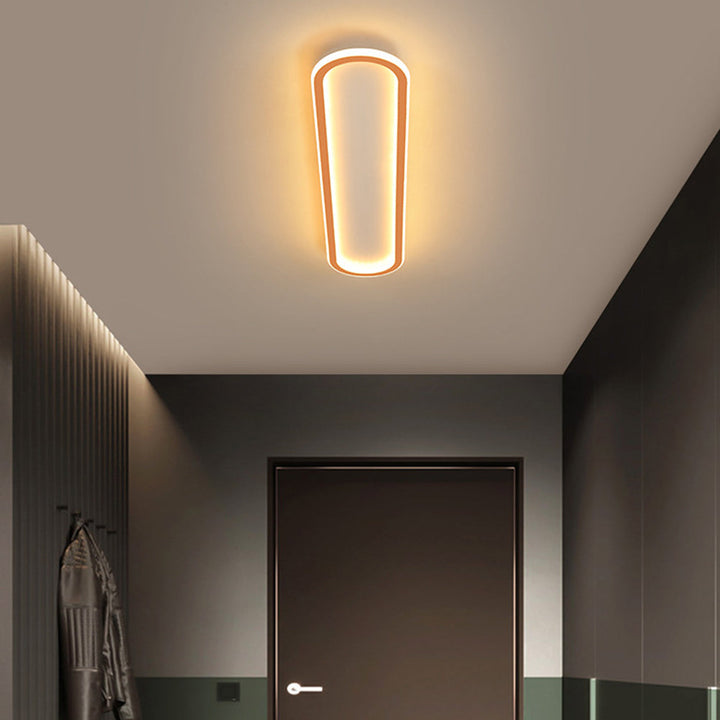 Unieke roségouden elliptische LED plafondlamp; een modern, minimalistisch statement piece. (91)