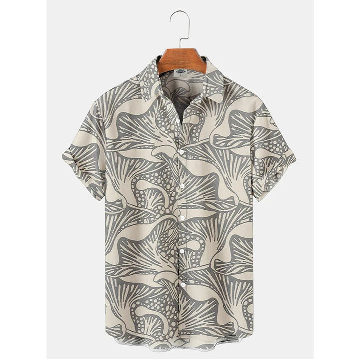 Heren Hawaii-shirt met levendige tropische print, perfect voor zomerse dagen en vakantie. Kortemouwen trendy strandshirt.