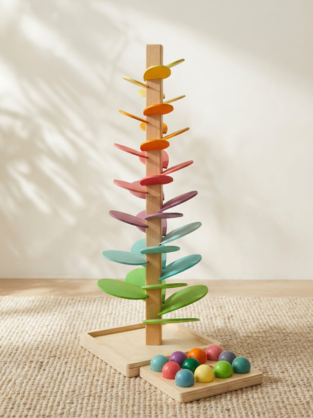 Houten Regenboog Geluidboom van Luca: educatief babyspeelgoed voor zintuigen en motoriek.