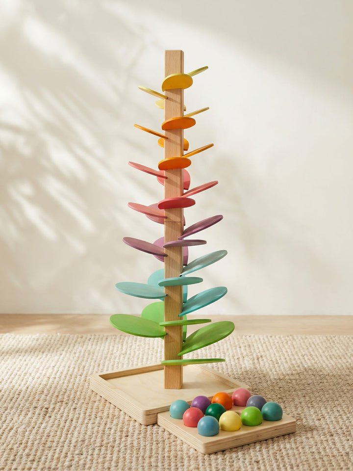 Houten Regenboog Geluidboom van Luca: educatief babyspeelgoed voor zintuigen en motoriek.