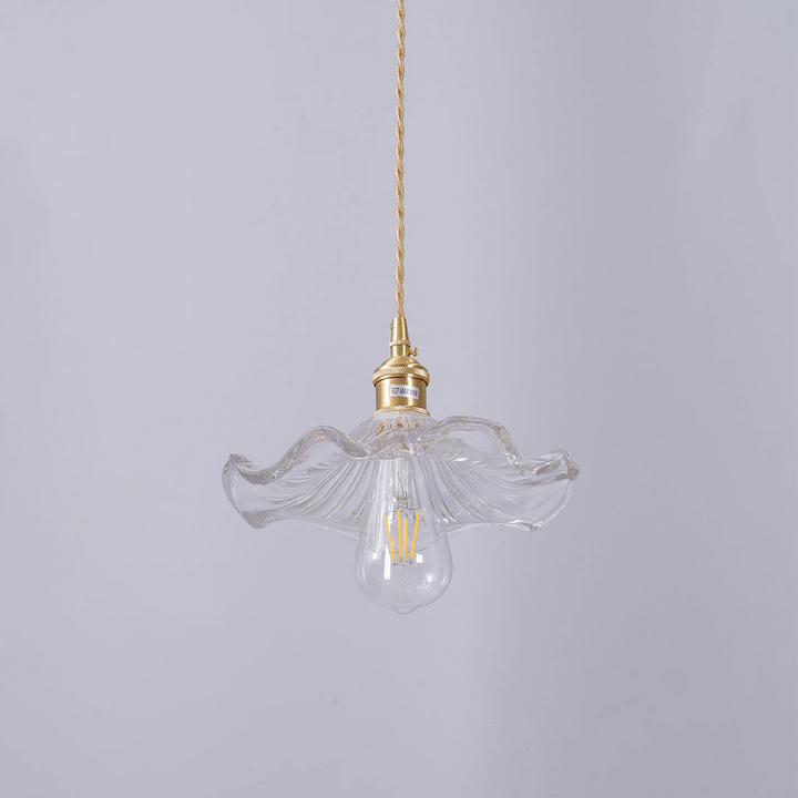 Moderne hibiscus hanglamp, perfecte sfeerverlichting voor uw interieur. Glazen kap en messing details.