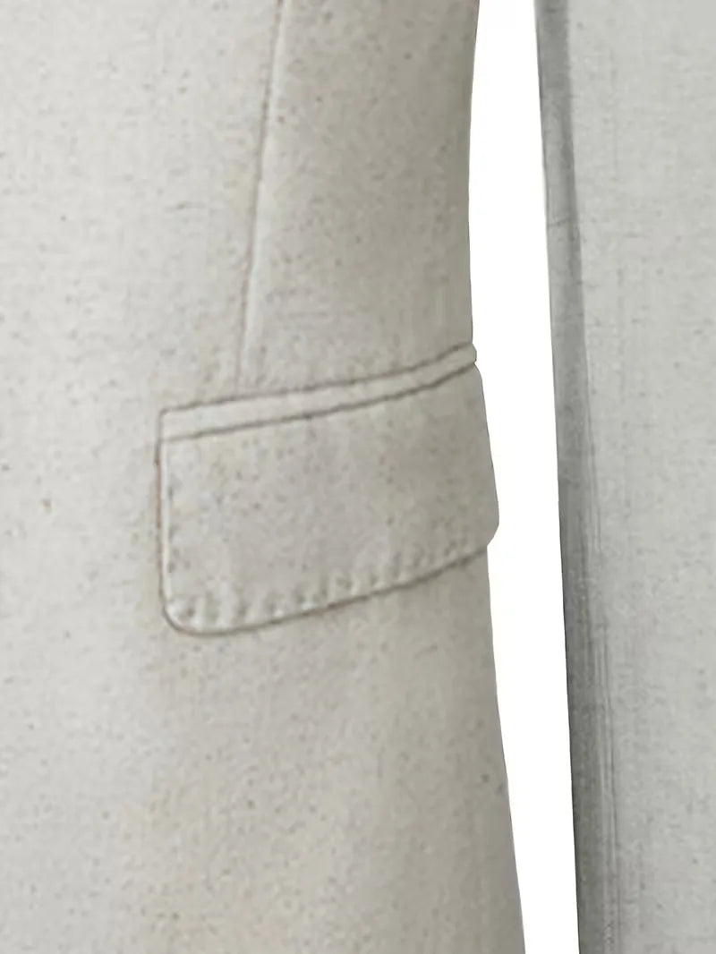 Modern slim fit beige linnen herenpak toont strakke pasvorm, ideaal als stijlvol zomerpak.
