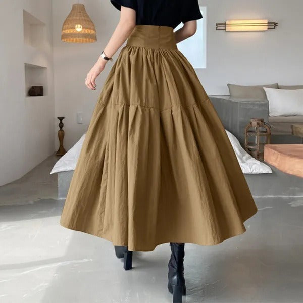 Elegante dames maxi rok met verfijnde plooien, ideaal voor een stijlvolle zomerlook met elastische taille.
