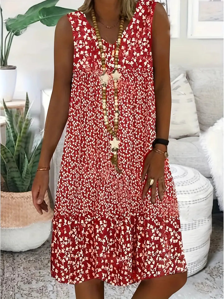 Luchtige dames zomerjurk met vrolijke bloemenprint, ideaal voor een comfortabele en stijlvolle casual look.