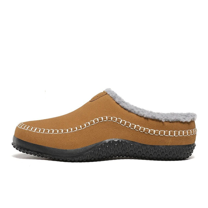 Comfortabele herenpantoffels; warme voering en duurzame antislip buitenzool.