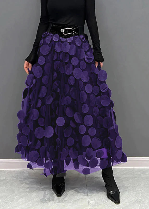 Midi damesrok met polkadot print, zwierig en veelzijdig voor zowel casual als chique outfits.