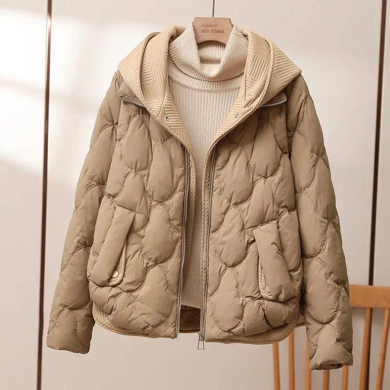 Stijlvolle dames pufferjas, warm en comfortabel. Ideaal als casual bovenkleding voor herfst en winter.
